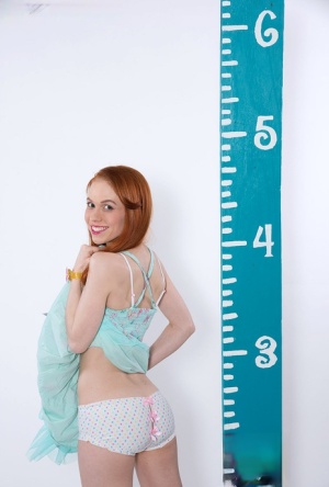 18 year old female Chloe Dash undressing on yoga mat on lawn